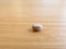 A grain of carioca beans, on a wooden table.