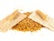 Grain crackers, biscuits and grains of wheat on white background