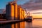 Grain deal concept, metal grain storage stands close up to Odessa sea port