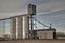 Grain Elevator alongside railroad tracks in small town in Texas.