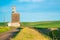 Grain elevator seen from wheat farm in the Palouse Washington state