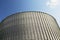 Grain elevator tank building on clear blue sky