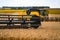 Grain harvesting equipment in the field. Harvest time. Agricultural sector