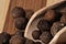 Grains allspice on a wooden board.