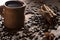 Grains of coffee, cuddly cookies on a wooden background. Photography in low key