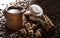 Grains of coffee, cuddly cookies on a wooden background. Photography in low key