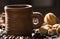 Grains of coffee, cuddly cookies on a wooden background. Photography in low key