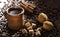 Grains of coffee, cuddly cookies on a wooden background. Photography in low key