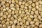 Grains of dried chickpeas background