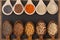 Grains and seeds variety in wooden spoons - healthy and diverse food concept