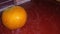 grainy and blurry picture of orange fruit bunch of oranges round yellow skin fruit