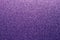 Grainy purple shiny background. Fabric sparkle, texture. Gradient on textile, clothes. Glitter wall. Material pattern, metallic