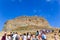 Gramvousa island, Greece 12 September 2013. Acrowd of tourists at the foot of the ancient fortress. Greek island of Gramvous in th