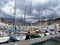 Gran Canaria, Spain - Feb 21, 2023: Colorful canarian fishing boats at the harbor in Puerto de Mogan, Gran Canaria,Spain