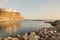 Gran Canaria, Spain. Long exposure photo during sunset on Amadores beach, smooth silky water, Puerto Rico town