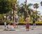 Gran Canaria, Spain - May 27,2018 A little childrens runs in the street and catches soap bubbles.
