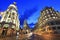 Gran VÃ­ailluminated at dusk, an upscale shopping street located in central Madrid