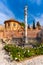 Granada, Spain. October 18th, 2020. External facade of the Collegiate Church of the Sacromonte Abbey with a column dedicated to