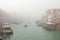 Grand Canal (Canal Grande). Foggy view from brige of Rialto