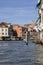 Grand Canal, historic decorative tenement houses by the water, Venice, Italy