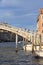 Grand Canal, Ponte degli Scalzi, vintage buildings, parked boats at the marina, Venice, Italy