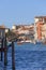 Grand Canal, Ponte dell`Accademia, vintage buildings, parked boat at the marina, Venice, Italy