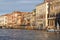 Grand Canal, vintage buildings, parked boats at the marina, Venice, Italy