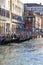 Grand Canal, vintage buildings, parked gondolas at the marina, Venice, Italy