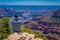 Grand Canyon,Arizona USA, JUNE, 14, 2018: View of unidentified man wearing a plaid shirt and hat, using his cellphone in