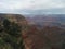 Grand Canyon landscape with distant storm clouds