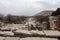 Grand colonnaded street with white marble pavement in ruins of the ancient city Sagalassos lost in Turkey mountains