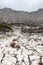 Grand colonnaded street with white marble pavement in ruins of the ancient city Sagalassos lost in Turkey mountains