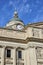 Grand Courthouse Clock and Dome under Blue Sky