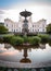 A grand fountain placed in front of the old university building in the medieval parts of Lund Sweden