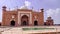 Grand imperial sandstone Persian style domed mausoleum Humayun Tomb in the landscaped char-bagh garden. A finest example of Mughal