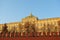 The Grand Kremlin Palace against the blue sky, behind the wall of the fortress. One of the palaces of the Moscow Kremlin, Russia