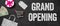 Grand opening written on a blackboard