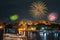 Grand palace and cruise ship in night with fireworks