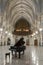 Grand piano in gothic church