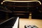 Grand Piano and seat in Concert Hall, close-up