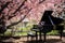 a grand piano under a blooming cherry blossom tree in a lush backyard