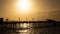 Grand Pier silhouetted by the summer sunrise