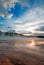 Grand Prismatic Spring under sunset cloudscape in the Midway Geyser Basin in Yellowstone National Park in Wyoming