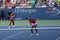 Grand Slam champions Serena Williams and Venus Williams during doubles match at US Open 2014