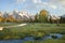 Grand Teton mountains with stream in morning light