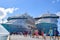 Grand Turk, Turks and Caicos - April 03 2014: Passengers returning to the Carnival Liberty and Carnival Victory Cruise Ships