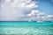 Grand Turk, Turks and Caicos Islands - December 29, 2015: powerboats in turquoise sea on cloudy sky. Boats on idyllic seascape. Wa