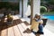 Granddaughter and grandmother embracing in a deck shade