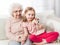 Granddaughter taking selfie with great-grandmother