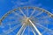 Grande Roue de Paris aka Big Wheel at Place de la Concorde on blue sky in Paris, France,